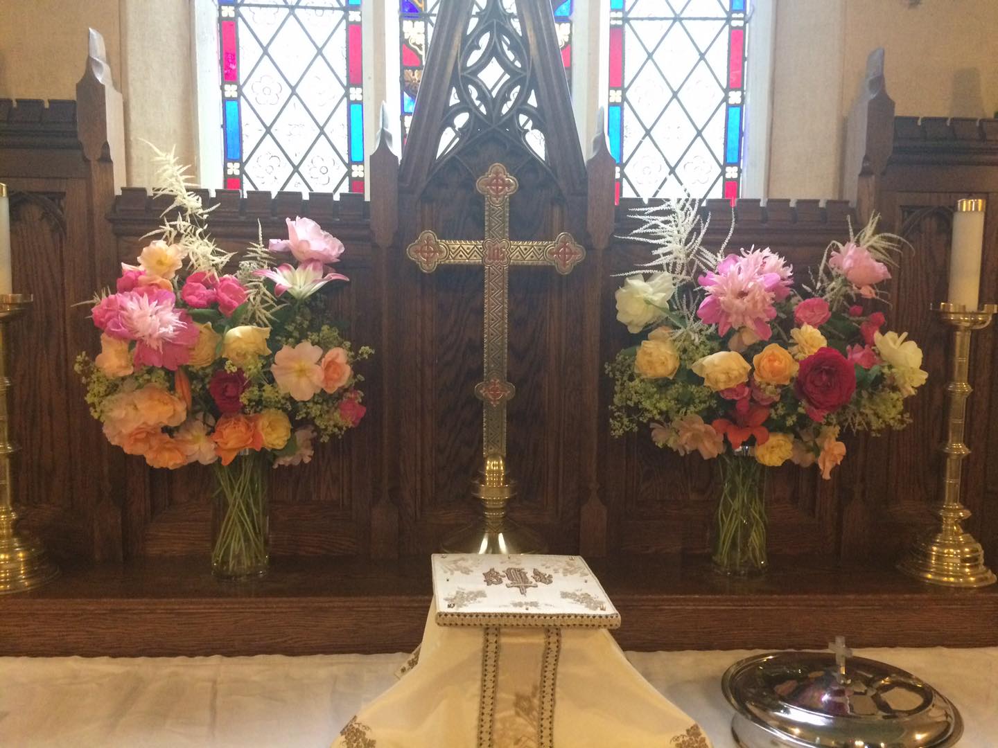 St. Luke's altar flowers pictured from June 30 and July 7 services are a combination of many different coloured roses, lilies, peonies, white astilbie and lady's mantle.